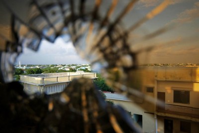 The skyline beyond the northern suburbs of Mogadishu in Somalia, seen through a bullet hole in the window of a hotel (file photo).